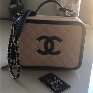 chanel nude and black vanity bag